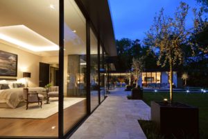 Ultraline black sliding doors modern new build