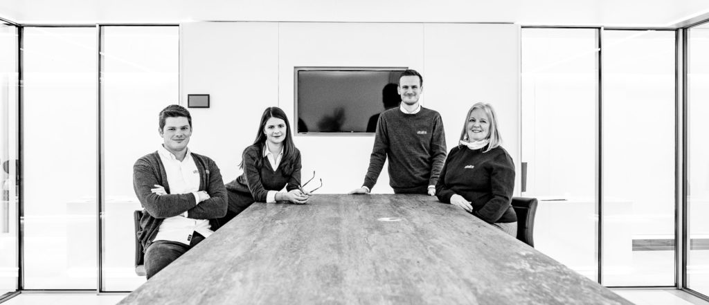 Ultraline Kent showroom team black and white