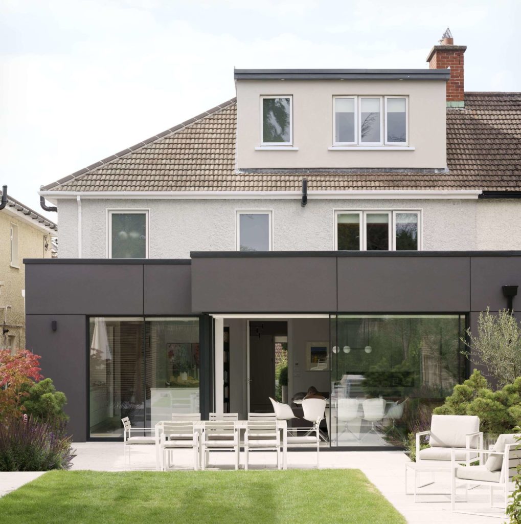 Ultraline 2 panel sliding door with opening corner in modern zinc clad extension