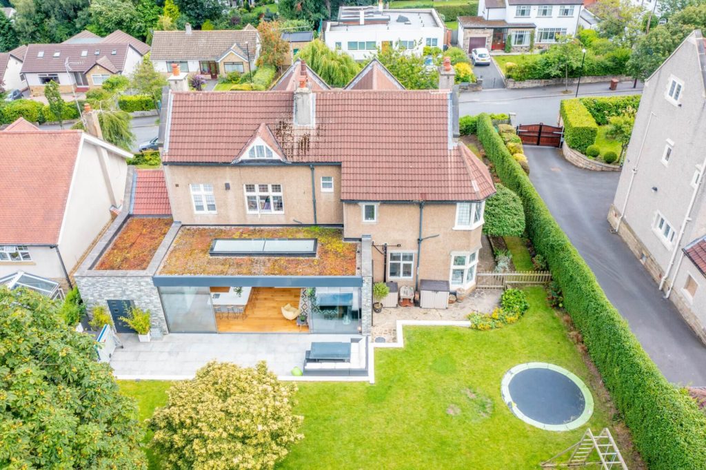 Traditional property with award winning Ultraline sliding doors in modern extension