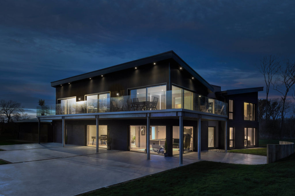 Black ultraline sliding doors with black cladding new build