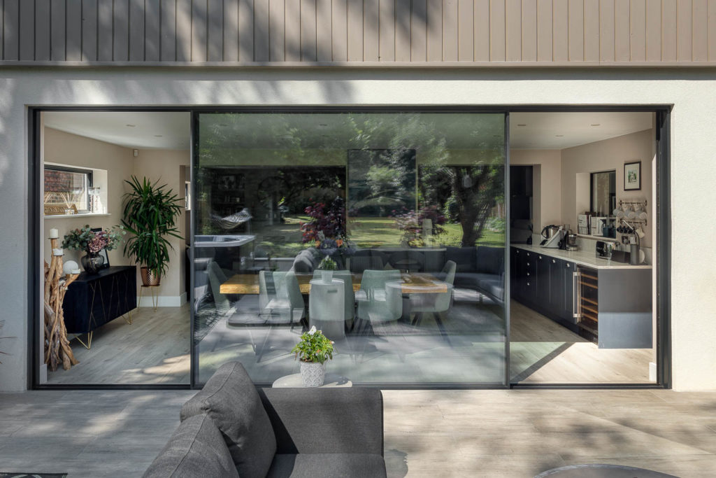 Black grey Ultraline sliding doors installation in Kent RAL7021