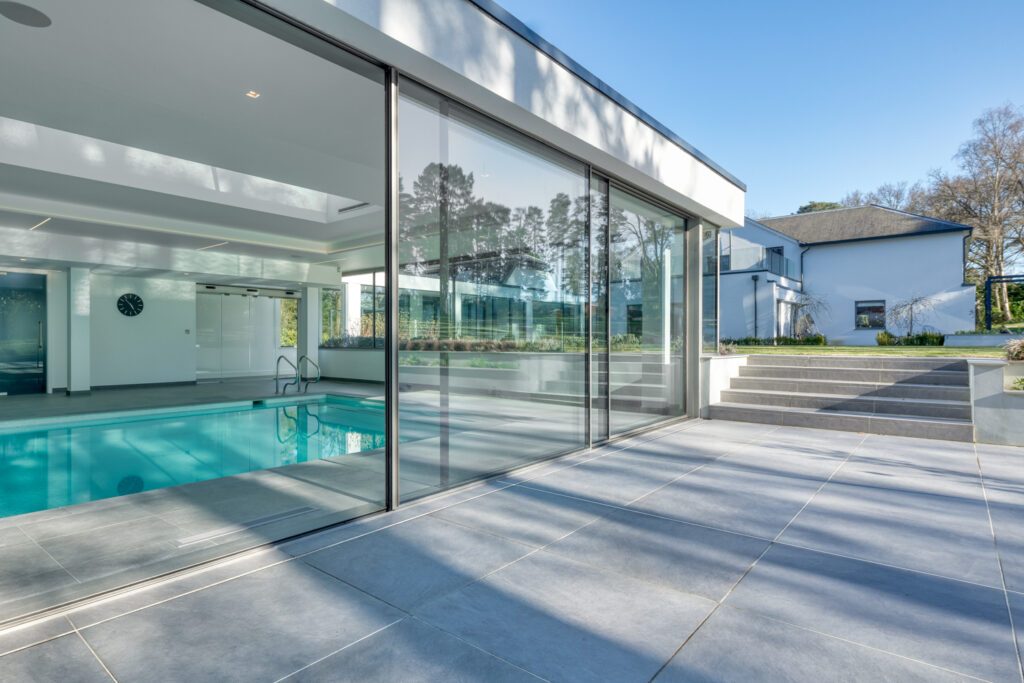 Pool house sliding doors from Minima Sliding doors installers silver sliding doors