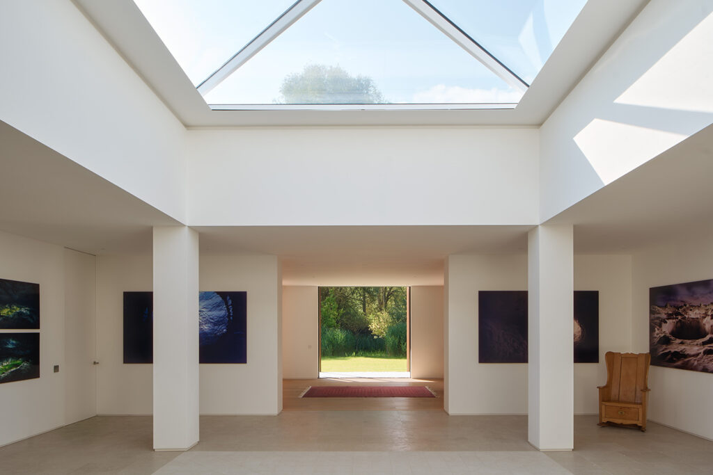 Bright interior with skylight and outdoor view.