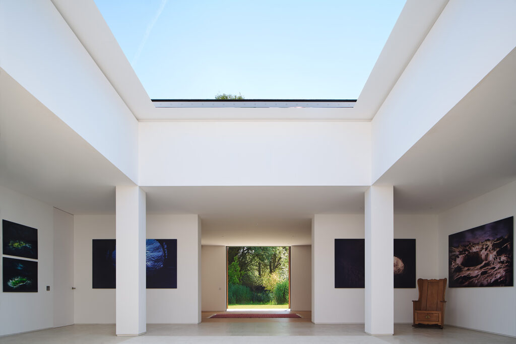 Modern art gallery interior with large skylight.